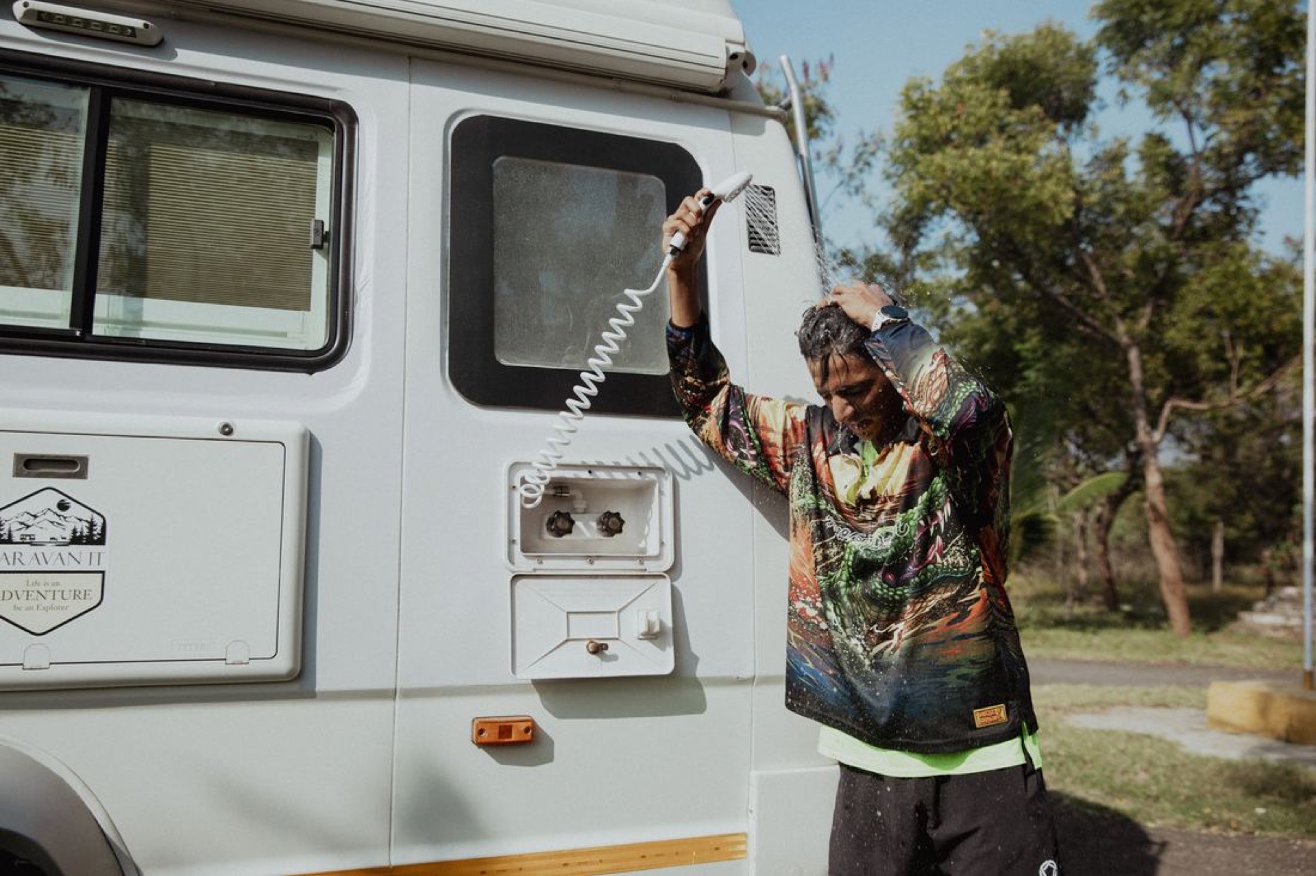 Washing off the day's dust outside the RV
